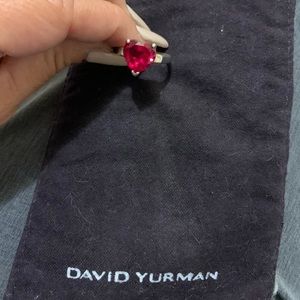 A sterling ring with a red ruby heart 💜